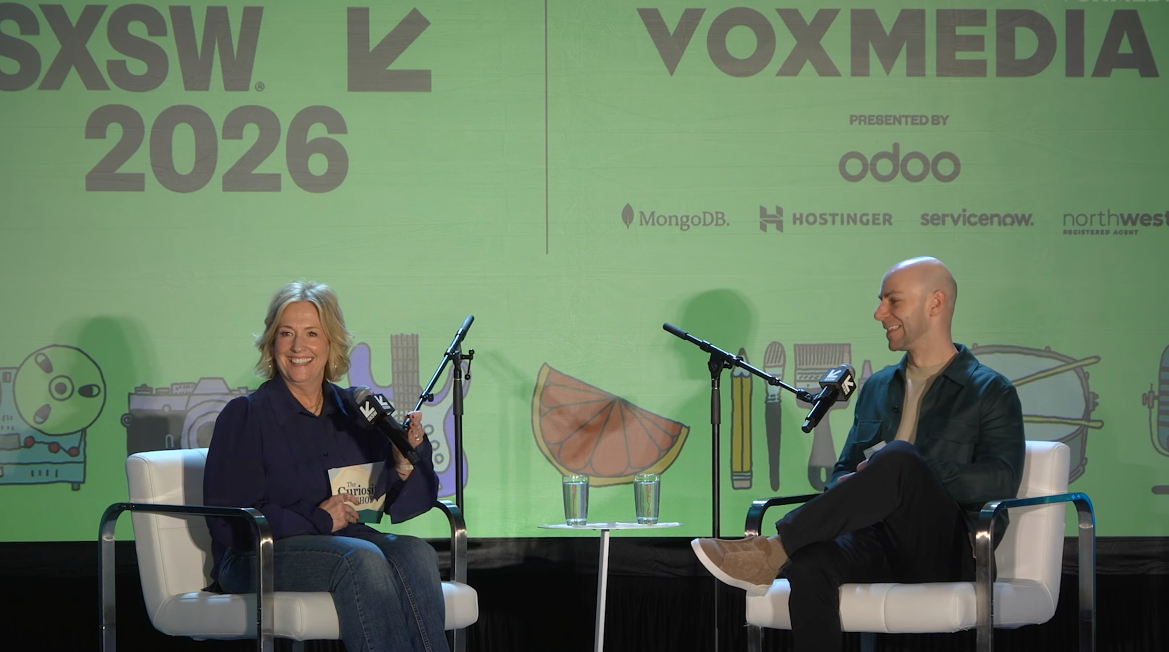 Brené Brown and Adam Grant recording a podcast together
